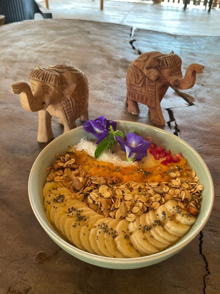 Fresh smoothie bowl with tropical toppings